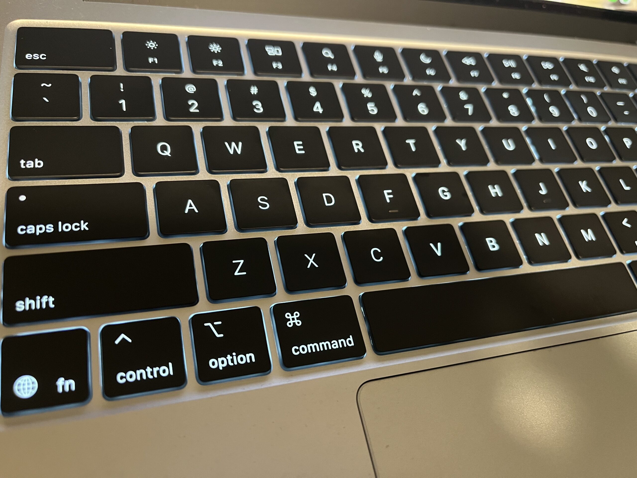 close photo of a laptop keyboard